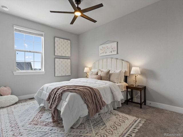 5399 Valentia St, Denver, CO 80238 - bedroom featuring baseboards, carpet floors, and a ceiling fan