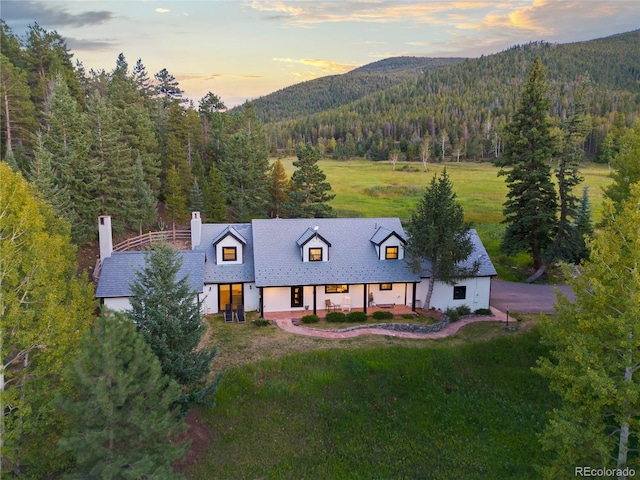 view of front of house featuring a mountain view