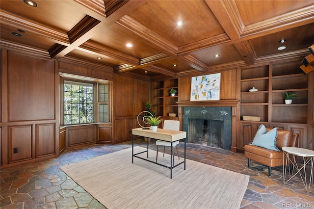 office with beamed ceiling, built in shelves, and coffered ceiling