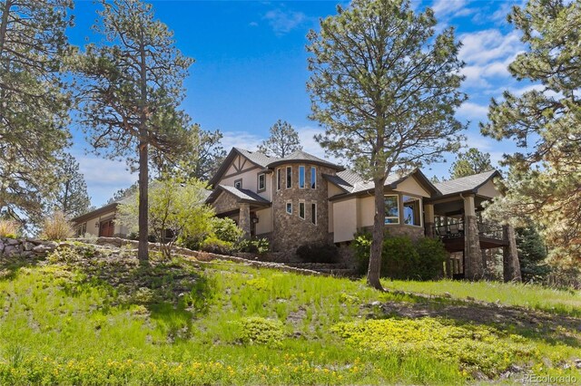10231 Democrat Rd, Parker, CO 80134 - view of front facade with stucco siding and stone siding