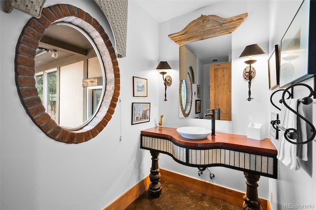 10231 Democrat Rd, Parker, CO 80134 - hall with a sink and concrete flooring