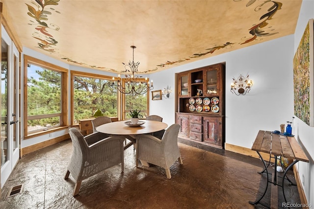 10231 Democrat Rd, Parker, CO 80134 - dining room featuring a chandelier and baseboards
