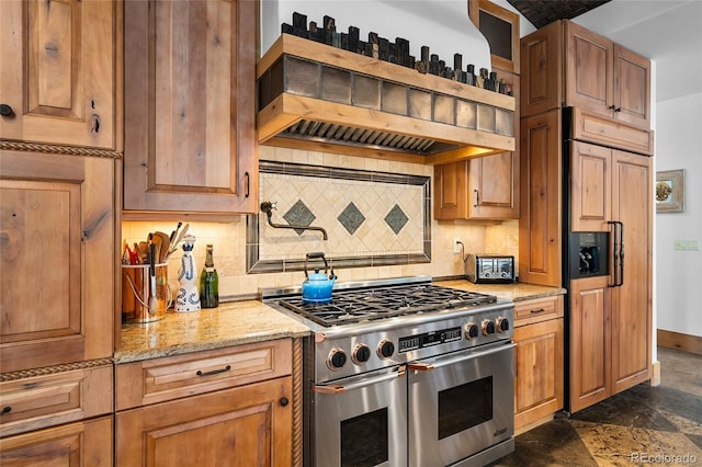 10231 Democrat Rd, Parker, CO 80134 - kitchen with high end appliances, range hood, light stone countertops, tasteful backsplash, and dark stone finish floors