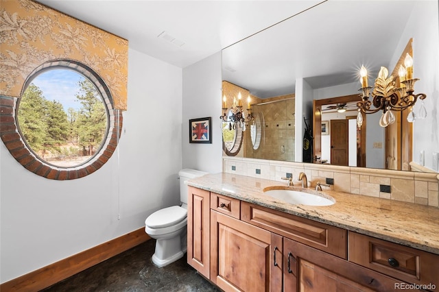 10231 Democrat Rd, Parker, CO 80134 - full bath featuring a chandelier, vanity, backsplash, a ceiling fan, and tiled shower
