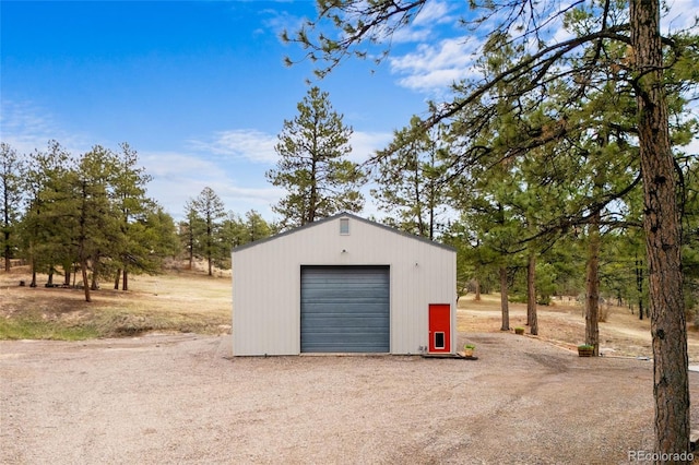 10231 Democrat Rd, Parker, CO 80134 - detached garage featuring dirt driveway