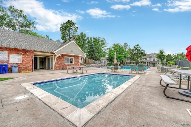 view of pool with a patio area