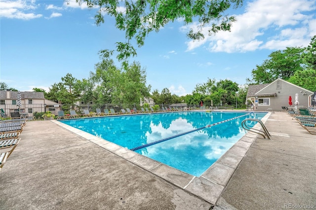 view of swimming pool featuring a patio