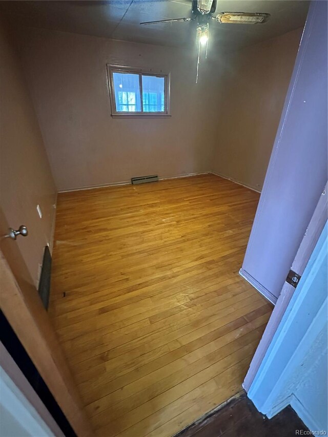 1114 La Due Ave, Alamosa, CO 81101 - spare room with a ceiling fan, light wood-type flooring, and visible vents