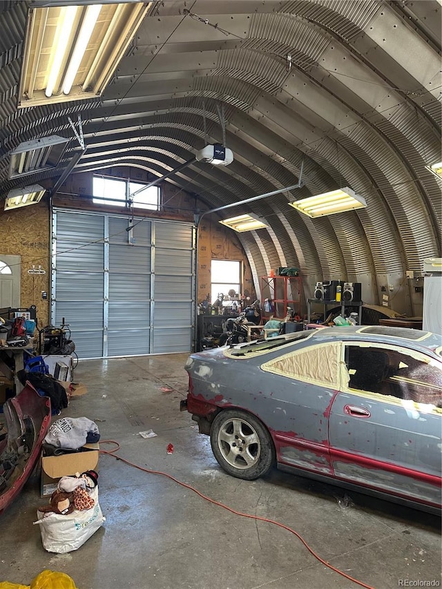 1114 La Due Ave, Alamosa, CO 81101 - garage featuring a garage door opener