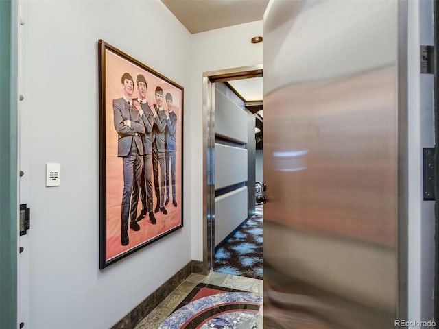 corridor with tile patterned floors