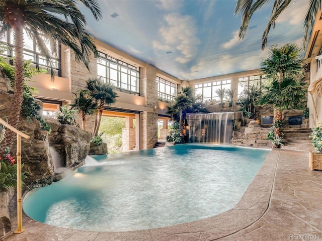 view of pool featuring pool water feature