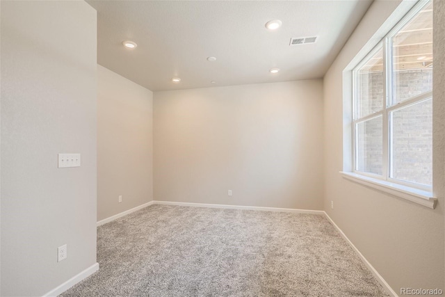 view of carpeted spare room