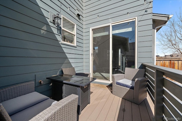 wooden deck featuring fence