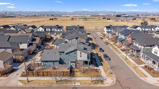 aerial view with a mountain view and a residential view