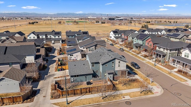 aerial view with a mountain view and a residential view