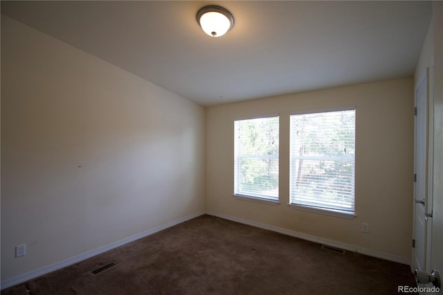 view of carpeted spare room