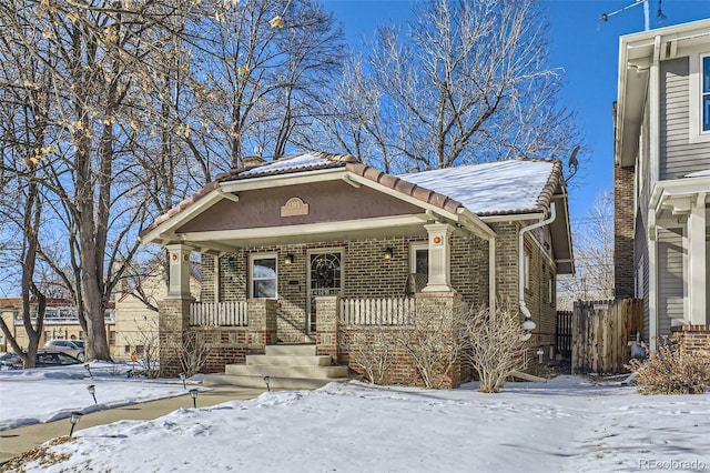 view of front of property featuring covered porch