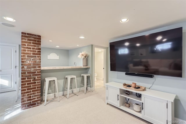 interior space featuring recessed lighting and light colored carpet