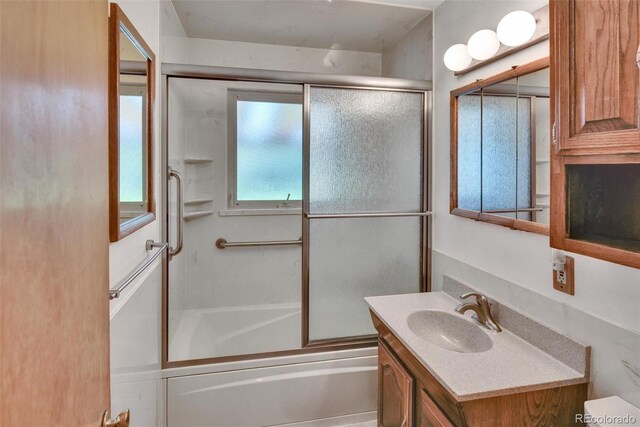 4960 S Fox St, Englewood, CO 80110 - full bath with vanity and bath / shower combo with glass door