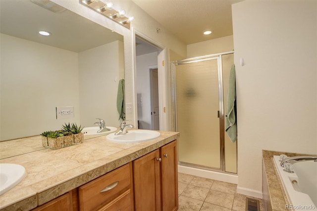 bathroom featuring vanity, separate shower and tub, and tile patterned flooring