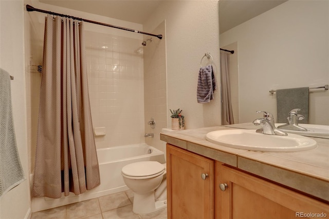 full bathroom featuring tile patterned flooring, vanity, toilet, and shower / bathtub combination with curtain