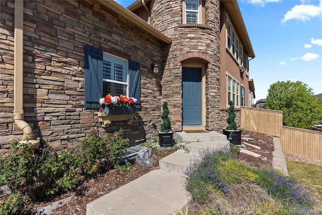 10840 Valleybrook Cir, Highlands Ranch, CO 80130 - doorway to property featuring stone siding