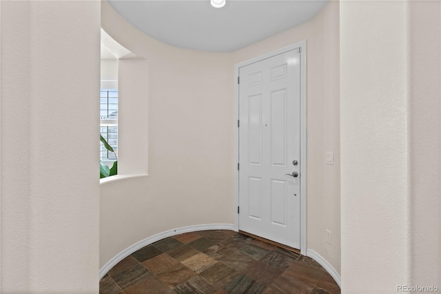 10840 Valleybrook Cir, Highlands Ranch, CO 80130 - doorway to outside with stone tile flooring and baseboards