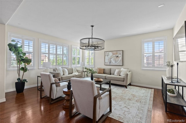 10840 Valleybrook Cir, Highlands Ranch, CO 80130 - living area featuring a chandelier and dark wood-style floors