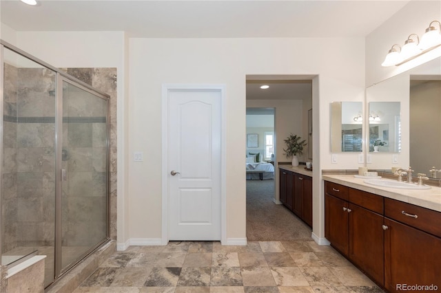 10840 Valleybrook Cir, Highlands Ranch, CO 80130 - ensuite bathroom featuring vanity, a stall shower, and recessed lighting