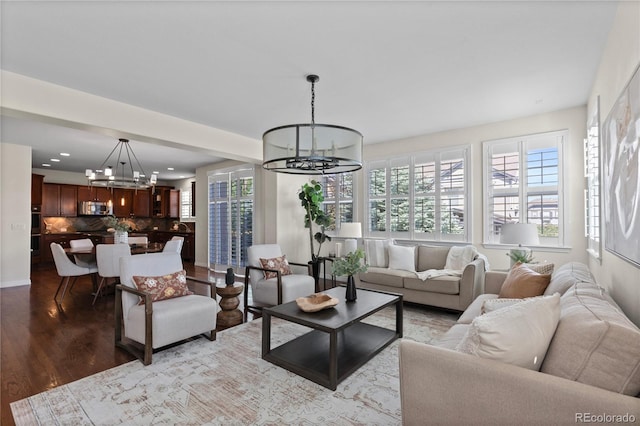 10840 Valleybrook Cir, Highlands Ranch, CO 80130 - living area featuring a chandelier, healthy amount of natural light, wood finished floors, and recessed lighting