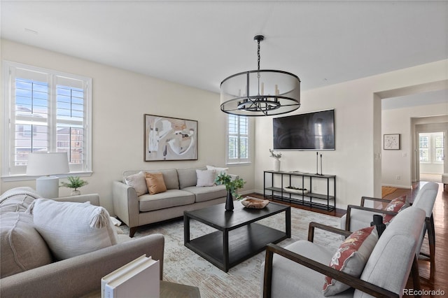 10840 Valleybrook Cir, Highlands Ranch, CO 80130 - living room with a chandelier and wood finished floors