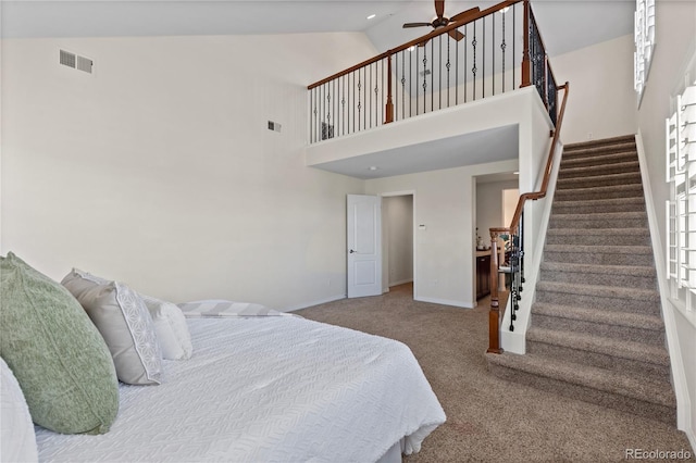 10840 Valleybrook Cir, Highlands Ranch, CO 80130 - carpeted bedroom with baseboards and high vaulted ceiling