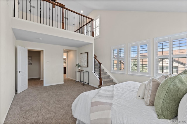 10840 Valleybrook Cir, Highlands Ranch, CO 80130 - carpeted bedroom with high vaulted ceiling and baseboards