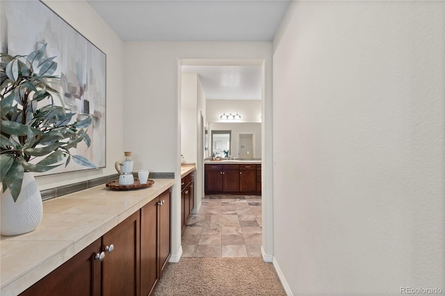10840 Valleybrook Cir, Highlands Ranch, CO 80130 - hall with light carpet and baseboards