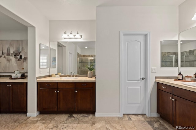10840 Valleybrook Cir, Highlands Ranch, CO 80130 - bathroom featuring a shower stall and two vanities