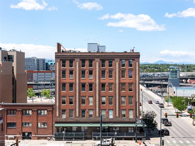 2261 Blake St Unit 2G, Denver, CO 80205 - view of building exterior featuring a mountain view and a view of city