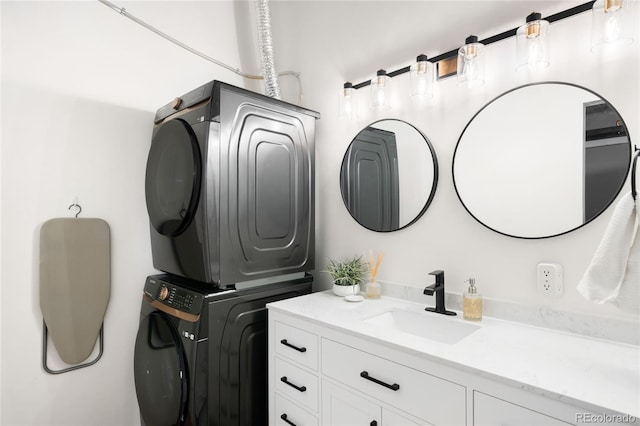 2261 Blake St Unit 2G, Denver, CO 80205 - laundry room with a sink and stacked washer and clothes dryer