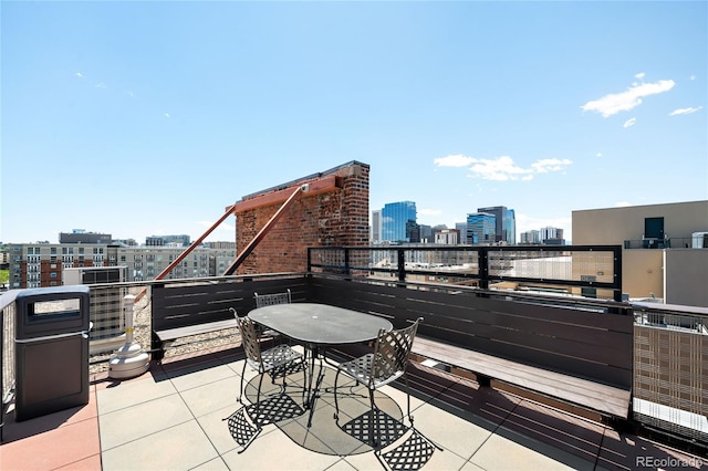 2261 Blake St Unit 2G, Denver, CO 80205 - view of patio / terrace with a view of city and a balcony
