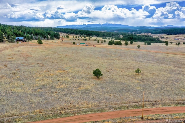 property view of mountains featuring a rural view