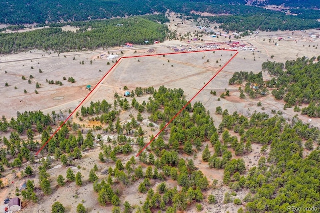bird's eye view featuring a rural view and a desert view