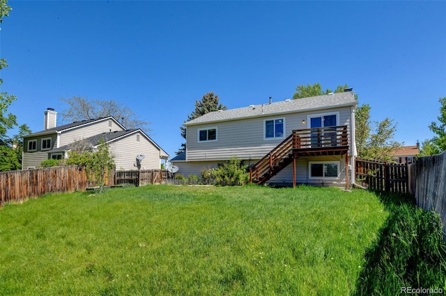 rear view of property with stairs and a deck