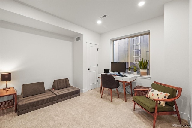 office space featuring light carpet, visible vents, and recessed lighting