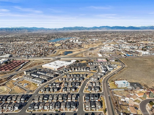 drone / aerial view featuring a mountain view and a residential view