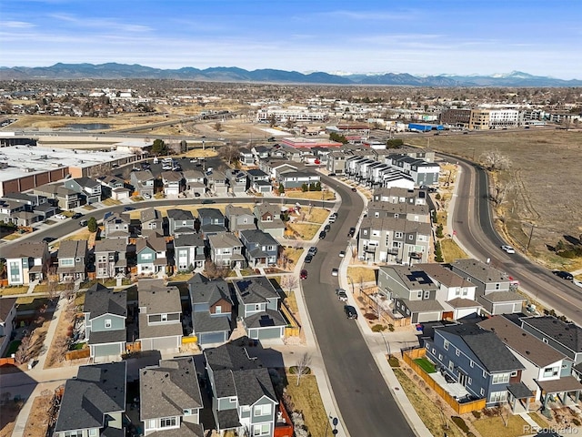 aerial view with a mountain view and a residential view