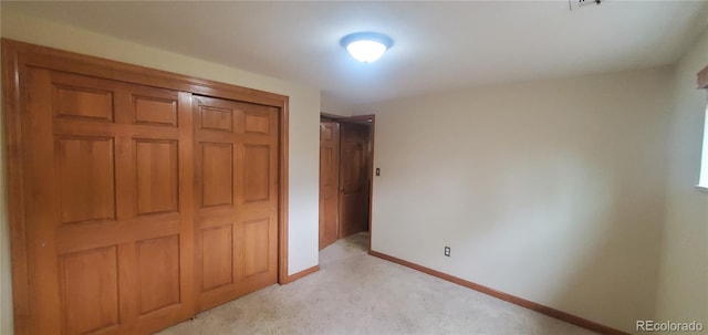 unfurnished bedroom featuring a closet