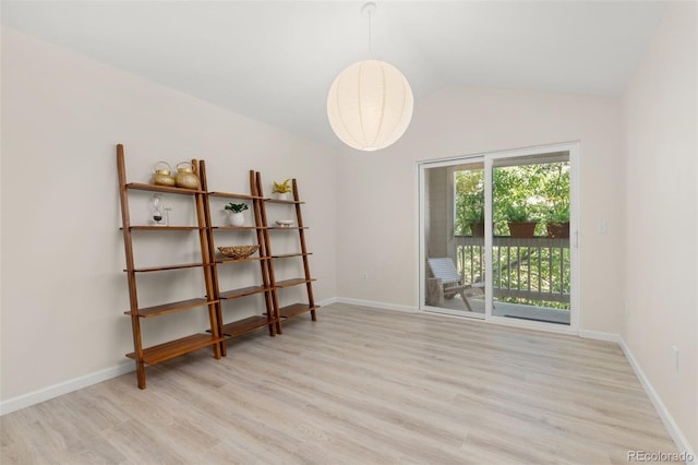 1158 Opal St Unit 203, Broomfield, CO 80020 - empty room featuring wood finished floors and lofted ceiling