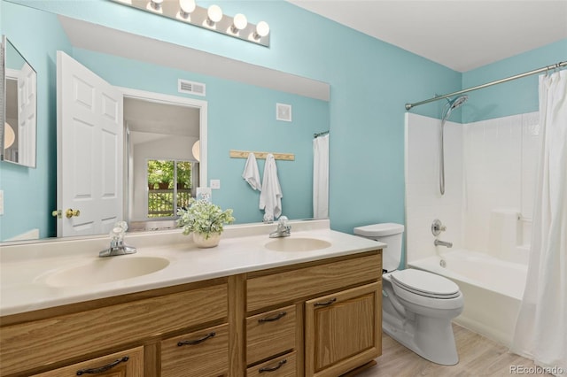 1158 Opal St Unit 203, Broomfield, CO 80020 - full bathroom with double vanity, shower / bath combination with curtain, and wood finished floors
