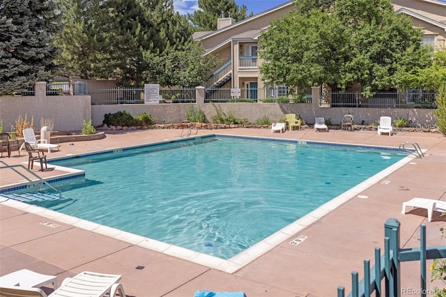1158 Opal St Unit 203, Broomfield, CO 80020 - community pool featuring a patio area