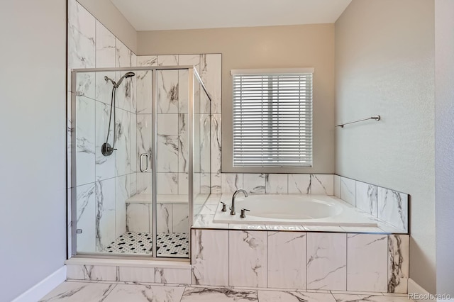 full bath with marble finish floor, a garden tub, and a marble finish shower