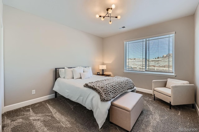 bedroom featuring carpet, visible vents, baseboards, and a notable chandelier